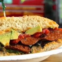 El mexicano sandwich · Spicy Chorizo, tropical cheese, lettuce, tomato, chipotle mayoand avocado.