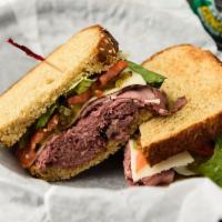 Manhattan Project Sandwich · Boar's Head brand cold rare filet of roast beef covered with horseradish cheddar cheese, pic...