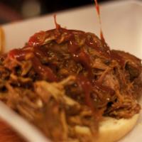 Pulled Pork · Pork Shoulder Slow Cooked in Au Jus, BBQ Sauce, Vinegar, Onions & Spices, Served on a Bun. A...