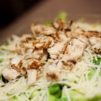 Caesar Salad · Chopped Romaine Lettuce with Shredded Parmesan Cheese, Garlic Croutons and Our House Caesar ...