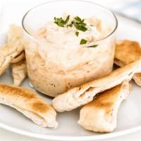 Homemade Hummus · Chickpeas pureed with crushed sesame seeds with a hint of lime and sea salt. Vegan.