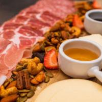 Cheese and Charcuterie Board · 3 rotating cheeses and charcuterie meats.