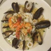 Seafood Pasta · Shrimp,calamari, scallops and calamari in a red or white clam sauce over your choice of pasta.