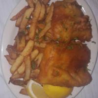 Fish and Chips · Served with coleslaw and tartar sauce.