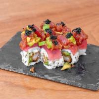 Katai Roll · Inside tempura shrimp, avocado, cream cheese outside torched tuna and topped with spicy tuna...