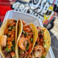 Surf andTurf Taco · Carne asada & shrimp melted Monterey cheese pico de gallo special sauce. Extra cheese is ava...
