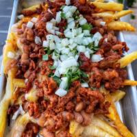 Pastor Fries · Cheese, beans, onions & cilantro.