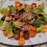 House Salad · Romaine lettuce, tomato, jalapeno, onion and seasonal veggies.