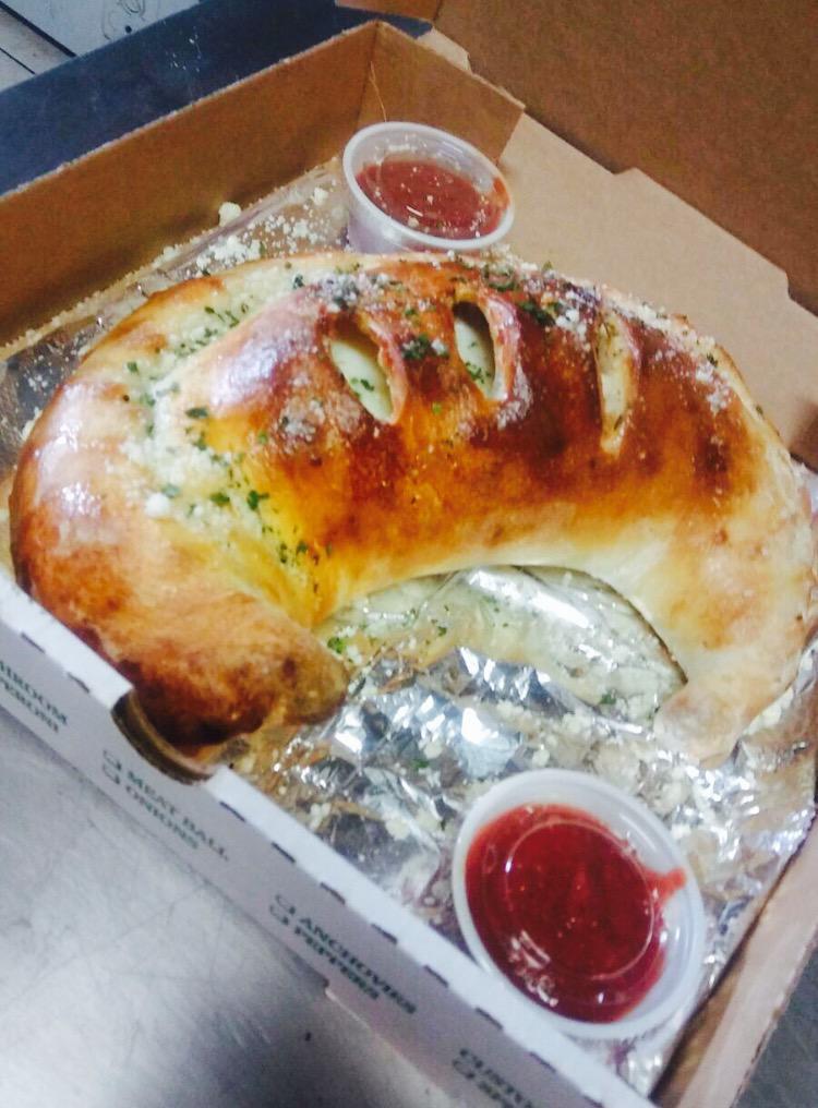 Large Calzone · Includes three toppings.