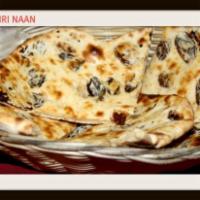 Kashmiri Naan · Leavened white bread stuffed with nuts and raisins.