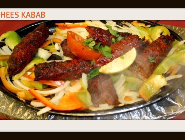 Sheesh Kabab · Finely minced lamb flavored with fresh herbs and spices.