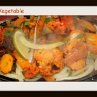 Tandoori Vegetables · Assorted vegetables marinated in yogurt, cheese and spices.