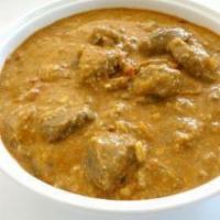 Lamb Korma · Cubes of lamb marinated in a creamy base, sauteed with onions and coriander.