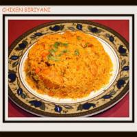 Chicken Biryani · Tender pieces of chicken cooked with saffron-flavored basmati rice and a touch of curry sauc...