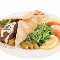 Falafel Sandwich · Delight lyrics spiced vegetarian patties made from a mixture of garbanzo and Fava beans, par...