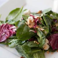 Insalata Invernale · Organic baby spinach, radicchio, grapes, gorgonzola cheese and sliced almonds in a red wine ...