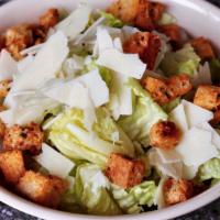 Caesar Salad · Romaine lettuce, croutons, and Parmesan cheese with Caesar dressing.
