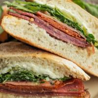 The Italian Sandwich · Prosciutto di parma, genoa salami, provolone, parmesan, arugula, balsamic dressing