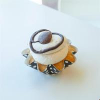 Cookie Dough Cupcake · Vanilla chocolate chip cake with chocolate chip cookie dough buttercream topped with chocola...