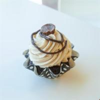 PB+C Cupcake · Decadent chocolate cupcake filled with our rich peanut butter mousse, then topped with peanu...