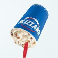 Butterfinger Blizzard Treat · Butterfinger candy pieces blended with creamy vanilla soft serve.
