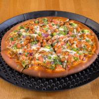 Chicken Tikka Pizza · Spiced chicken tikka, red onions, tomatoes and fresh cilantro.