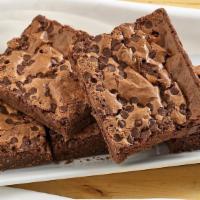 Brownie Cheesecake · A chocolate brownie loaded with chocolate chips. (GS)  *best consumed warm