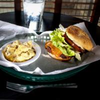 Garrett's Cheeseburger · 1/2 lb. of fresh 100% Angus beef served on a toasted bun topped with lettuce, tomato, pickle...
