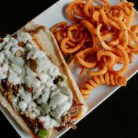 Philly Sandwich · Thinly sliced sirloin on a toasted hoagie bun with grilled onions, mushrooms and green peppe...