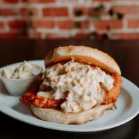 Nashville Hot Chicken Sandwich · Choice of grilled or crispy, served on a toasted bun with pepper jack cheese, pickles and ho...