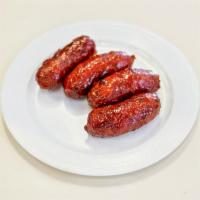 4 Piece Pork Longanisa Sausage · Uni-Mart special pork longanisa sweet sausage in natural casings and no artificial coloring.
