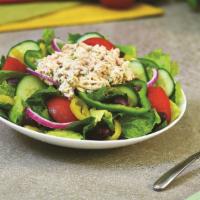 Tuna Salad · Mixed lettuce, green pepper, tomato, wedges, red onion, cucumbers, Kalamata olives, banana p...