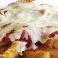 Pizza Fantastic Fries · Crispy french fries topped with pizza sauce and natural cheeses.
