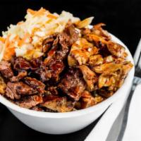  Yumbo Chicken  and Steak Bowl  · Steamed white rice, 1/2 pound charbroiled chicken and 1/2 pound Steak, and steamed cabbage 
