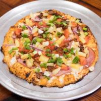 Maui Zaui with Ham Pizza · Ham, crisp bacon, juicy pineapple, tomatoes, red and green onions on polynesian sauce. Avail...