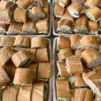Party Trays (serves 8-10 people) 24-3” sandwiches · Choose any two of our Haus Special Sandwiches (1/2 - 1/2).   Name both in special instructio...