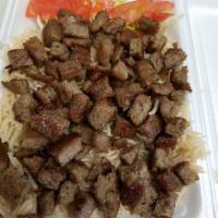 Lamb Gyro Platter Special · Basmati rice, tomatoes, lettuce, red onions, house sauce.
