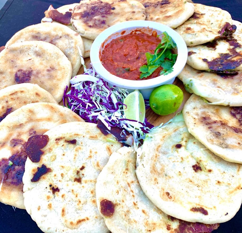 Dozen Pupusas · 12 delicious pupusas that come with curtido - cabbage slaw and house made salsa. Choose from: revuelta (pork, bean and cheese-bean and cheese-chicken & cheese-alepeno & cheese-pepperoni and cheese.
