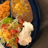 3 Flautas · Shredded beef, pork or chicken with lettuce, tomatoes,sour cream, and guacamole. Served with...