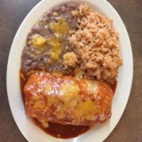 Combo Burrito · Smothered with sauce and cheese. Stuffed with cheese and your choice of meat. Beans and rice...