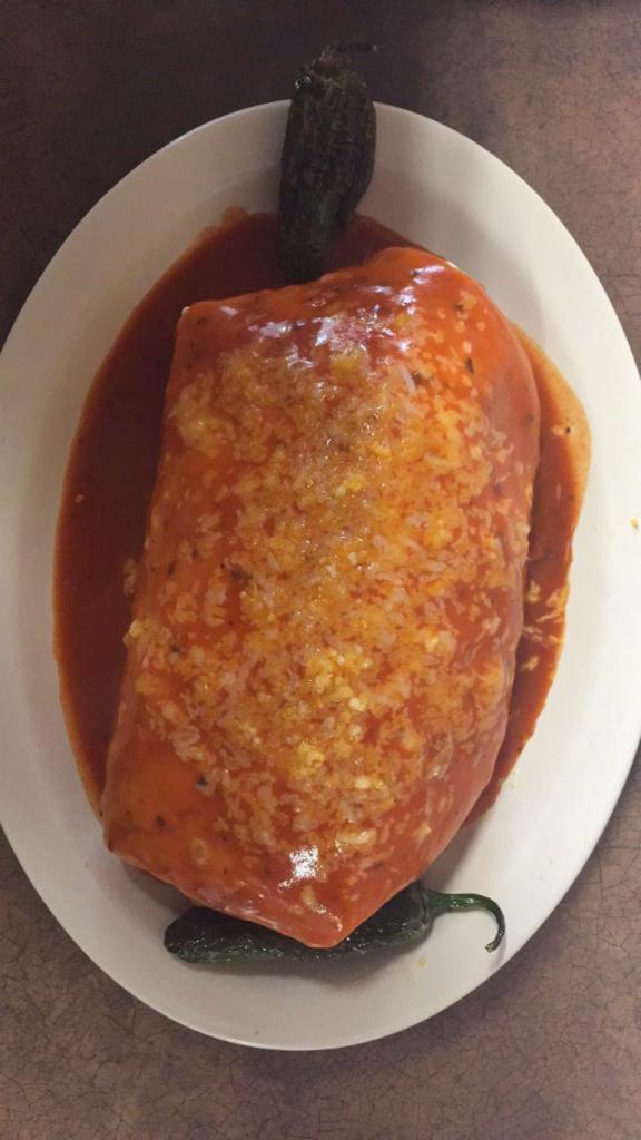 Colorado Burrito · Big burrito with your choice of meat and stuffed with lettuce, rice, beans, cheese, pico de gallo, guacamole, and sour cream. Smothered in sauce.