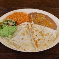 Quesadilla · Your choice of pork, asada, chicken, or shredded beef with rice, beans, lettuce, guacamole, ...