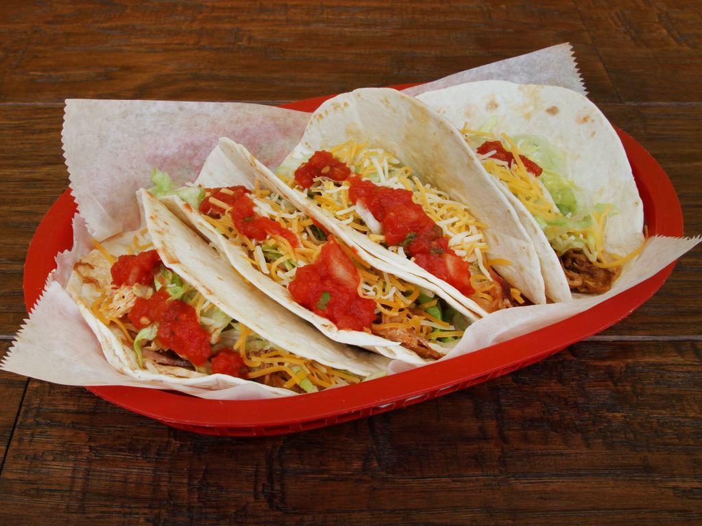 Soft Taco · Flour tortilla with your choice of meat. Topped with lettuce, cheese, and mild salsa.
