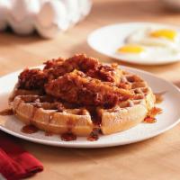 Chicken and Waffles · Freshly made Belgian waffle served with hand-breaded chicken tenders, sprinkled with powdere...