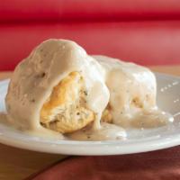 Biscuits and Gravy · Warm biscuits topped with country sausage gravy.