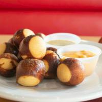 Pretzel Bites · Flash fried and lightly salted. Served with 4 cheese sauce and honey mustard.