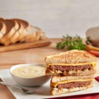 Patty Melt · Fresh seasoned beef patty with melted American and Swiss cheeses and caramelized onions on g...
