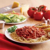 Pasta · Choice of meat or marinara sauce over penne or spaghetti noodles with a grilled garlic roll ...