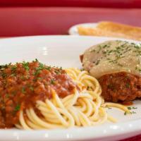 Chicken Parmesan · Breaded and fried chicken breast topped with marinara sauce and melted mozzarella cheese. Se...