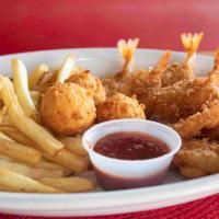 Shrimp Dinner · 10 shrimp breaded in special seasoning. Served with fries, hush puppies, coleslaw and Big Bo...